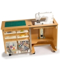 Horn Cub Plus 1010 Sewing Cabinet showing sewing machine in flat bed use.