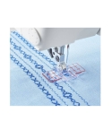 The Pfaff Multi Line Decorative Stitch Foot is 2" wide with many marking guide lines
