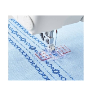 The Pfaff Multi Line Decorative Stitch Foot is 2" wide with many marking guide lines